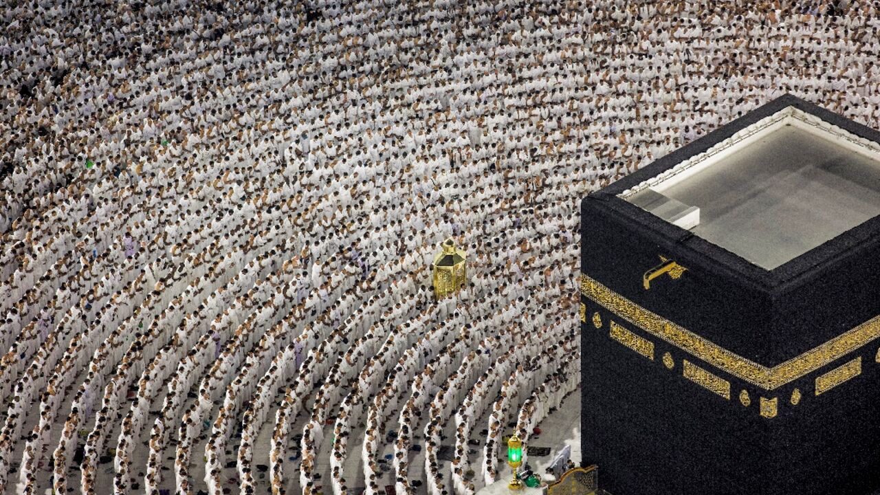 Muslim worshippers pray around the Kaaba, Islam's holiest shrine, in Mecca during Ramadan