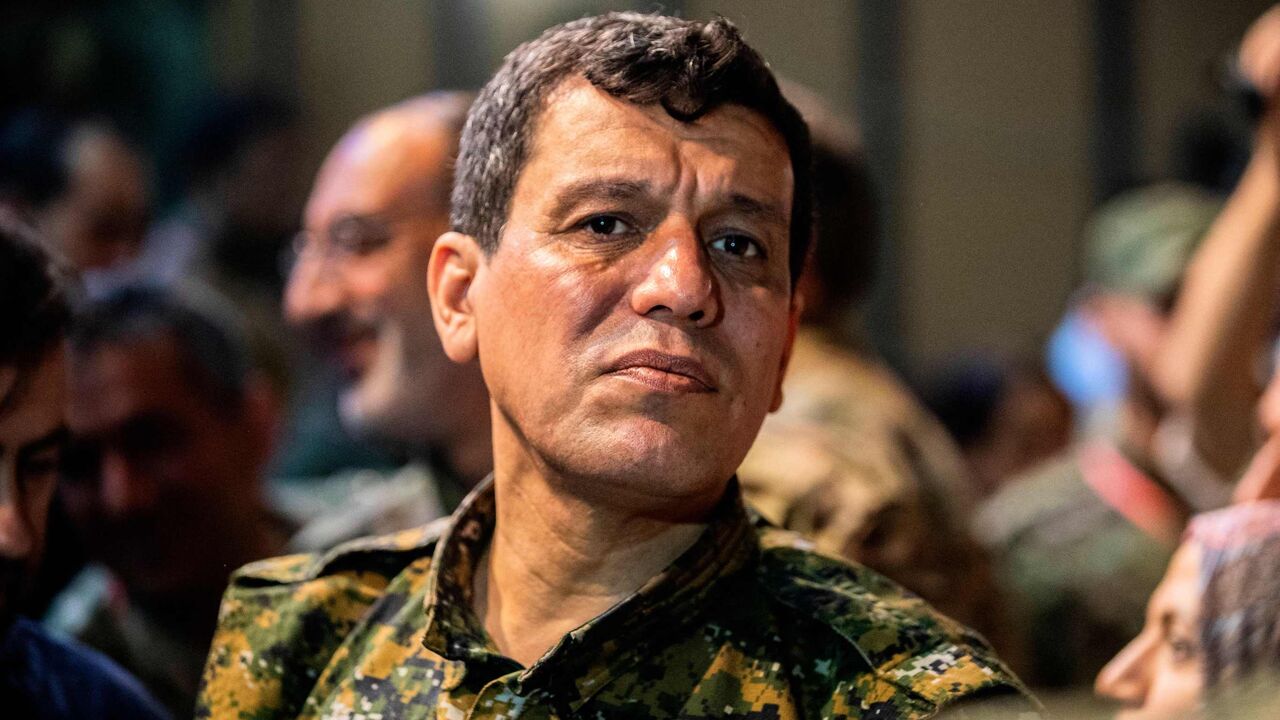 Mazloum Abdi (Kobani), commander-in-chief of the Syrian Democratic Forces (SDF), attends a meeting with other commanders and representatives of the US-led coalition fighting the Islamic State (IS) group, in the northwestern Syrian city of Hasakah, in the province of the same name, on Aug. 24, 2019.  