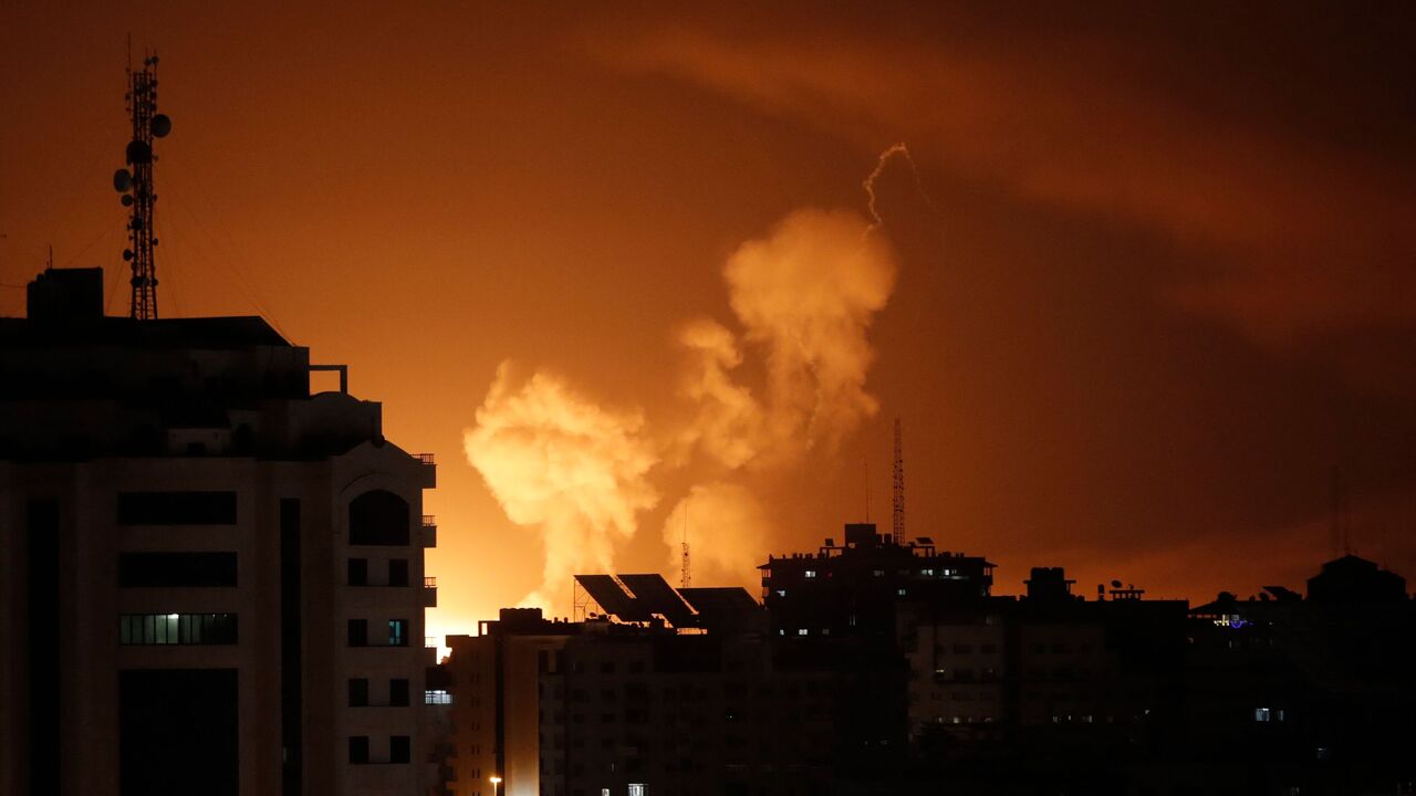 Smoke rises above buildings in Gaza City as Israel launches air strikes in Gaza