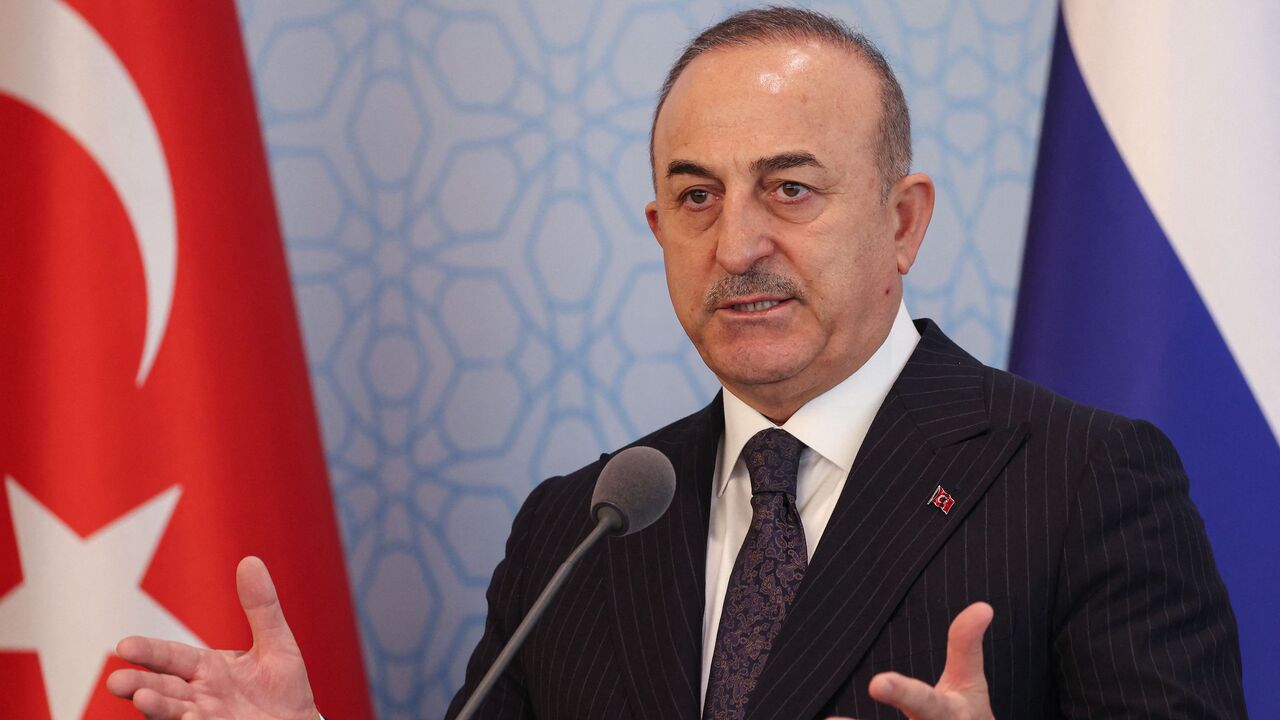 Turkish Foreign Minister Mevlut Cavusoglu speaks.