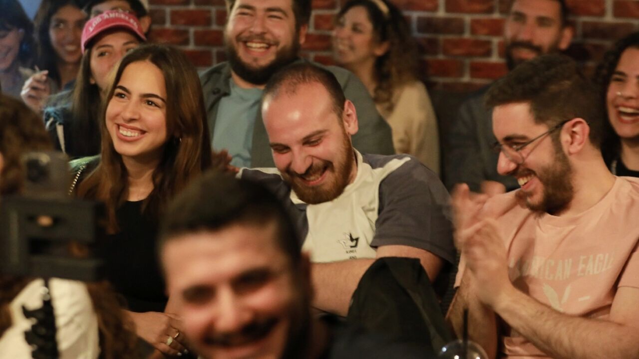 Every week in a Damascus cafe, comedians crack jokes about daily struggles like power cuts and fuel shortages after 12 years of war