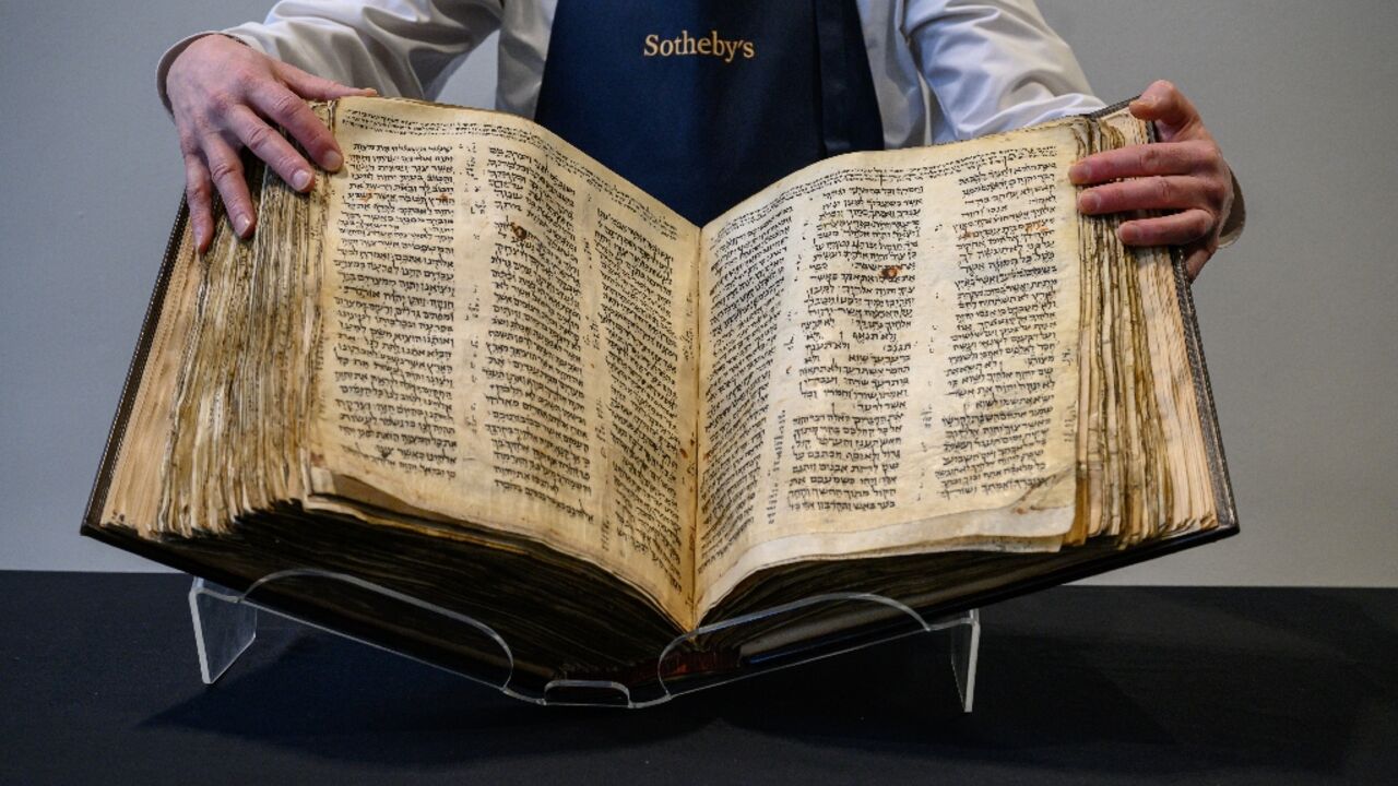 The 'Codex Sassoon' Bible is displayed at Sotheby's in New York in February 2023
