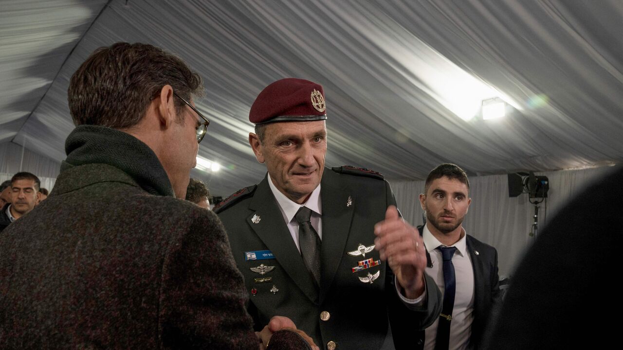 Israel's new army chief of staff Herzi Halevi (C) speaks to a supporter following his official appointment ceremony in Jerusalem, on January 16, 2023. (Photo by Maya Alleruzzo / POOL / AFP) (Photo by MAYA ALLERUZZO/POOL/AFP via Getty Images)