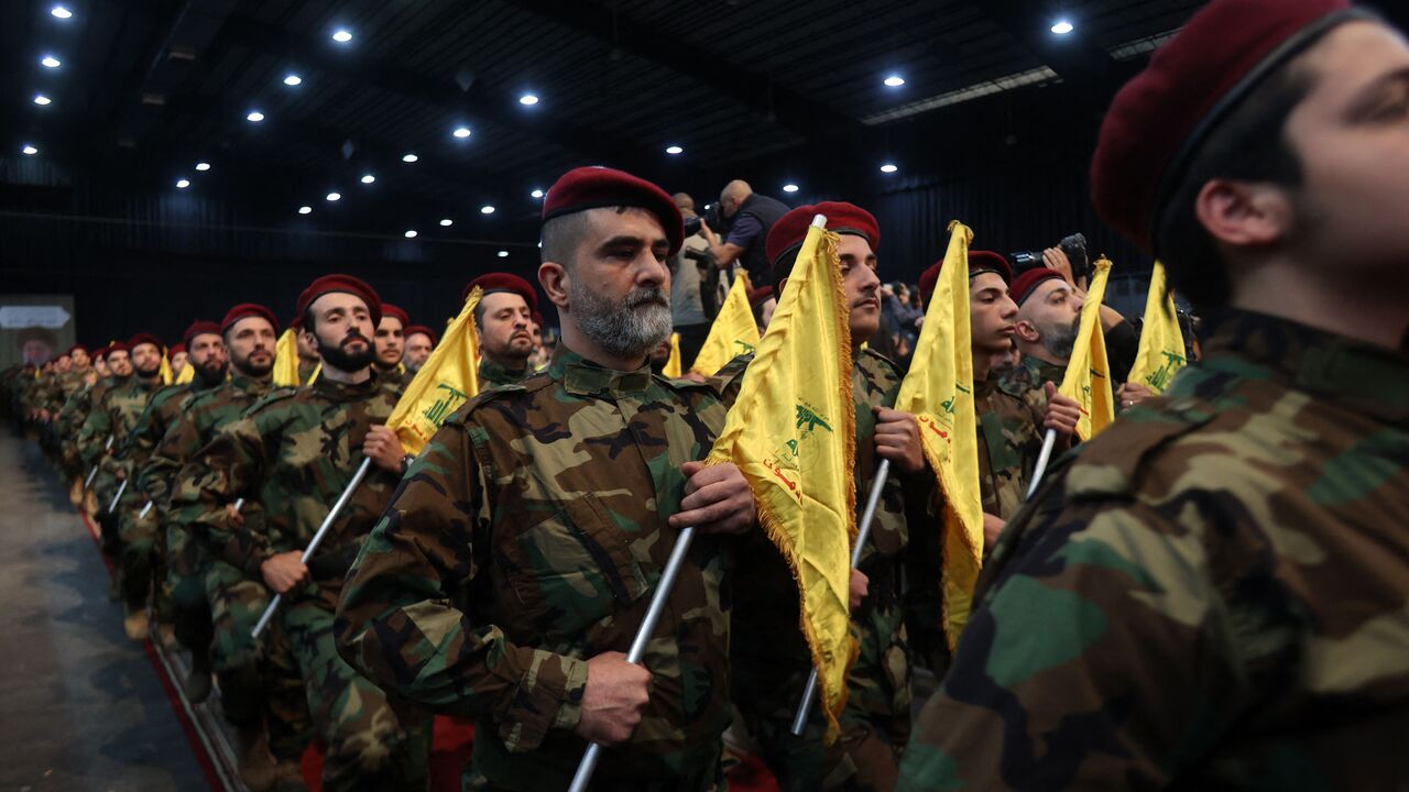 Militants with the Lebanese Shiite movement Hezbollah, parade in Beirut's southern suburbs on April 14, 2023, to mark Al-Quds (Jerusalem) Day, a commemoration in support of the Palestinian people celebrated annually on the last Friday of the Muslim fasting month of Ramadan. (Photo by ANWAR AMRO / AFP) (Photo by ANWAR AMRO/AFP via Getty Images)