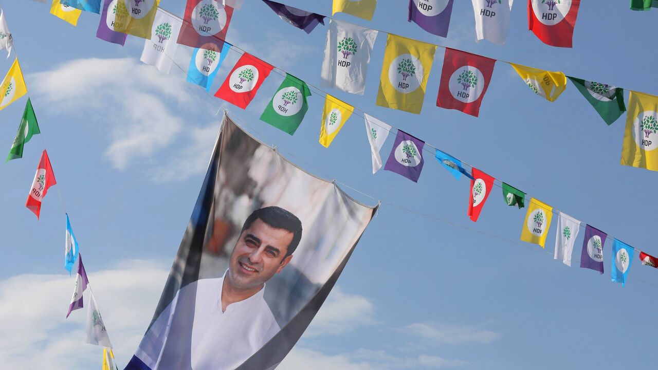 A picture shows election flags displaying imprisoned Selahattin Demirtas.