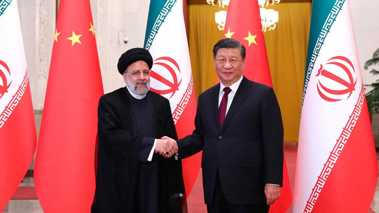 Iranian President Ebrahim Raisi shakes hands with Chinese President Xi Jinping during a welcoming ceremony in Beijing, China, February 14, 2023. Iran's President Website