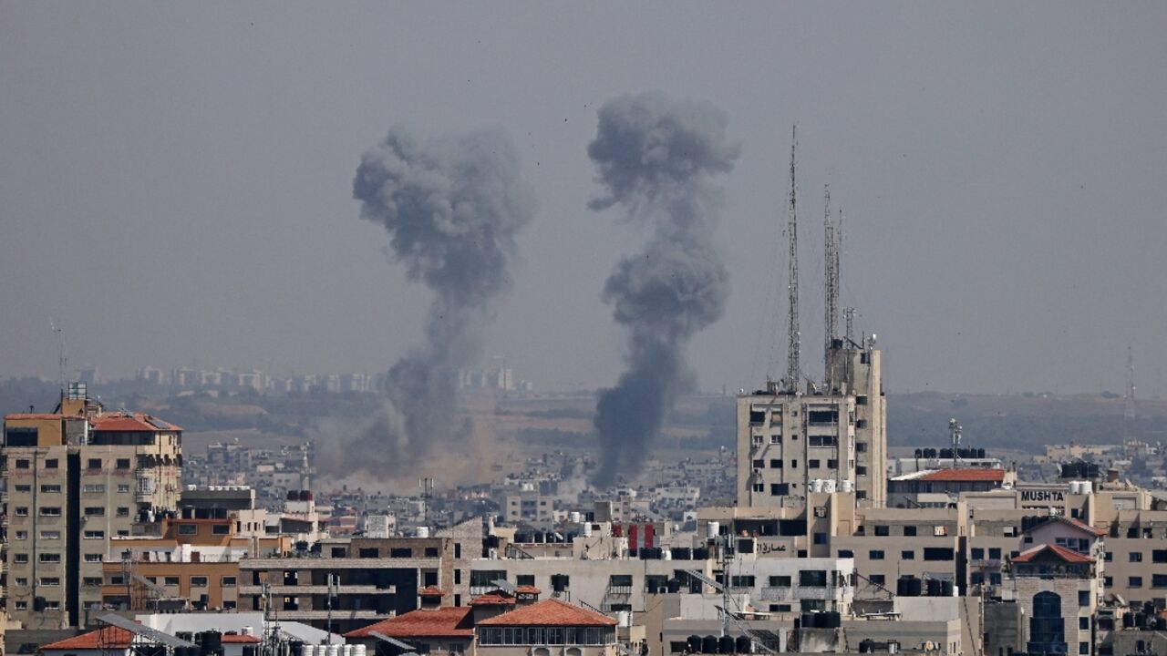 Smoke billows following Israeli strikes on Gaza City on May 10, 2023