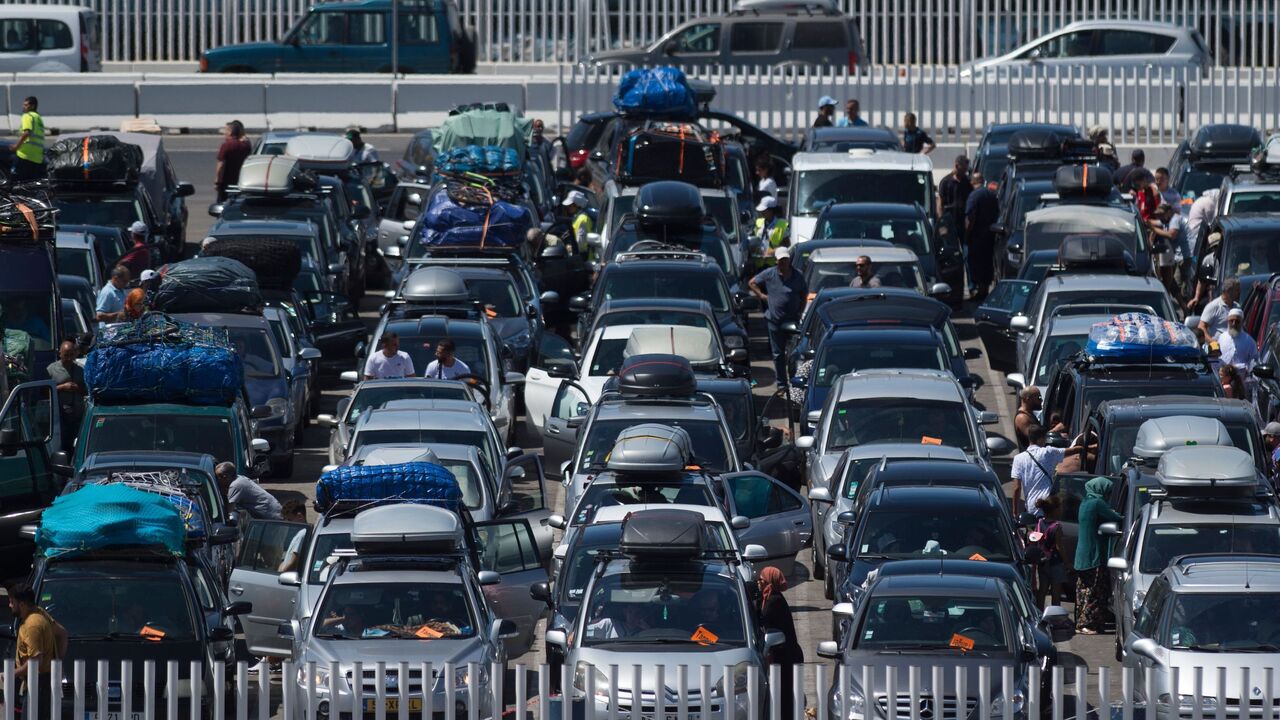 Cars queue before embarking on ferries bound for Tangier at the Algeciras port on July 27, 2019. - Thousands of Moroccan nationals working and living in Europe pass through the Strait of Gibraltar as they return to spend summer holidays in Morocco. (Photo by JORGE GUERRERO / AFP) (Photo credit should read JORGE GUERRERO/AFP via Getty Images)