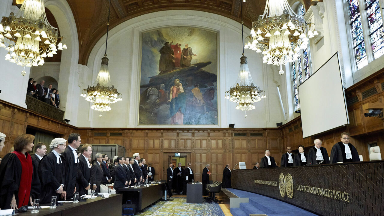 Judges enter the courtroom prior to the verdict in the case against Japanese whaling at the International Court of Justice, The Hague, Netherlands, March 31, 2014.