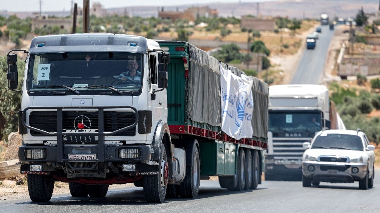 The 10-truck UN aid convoy crosses into Syria's rebel-held Al-Nayrab, headed for storage facilities near the Turkish border