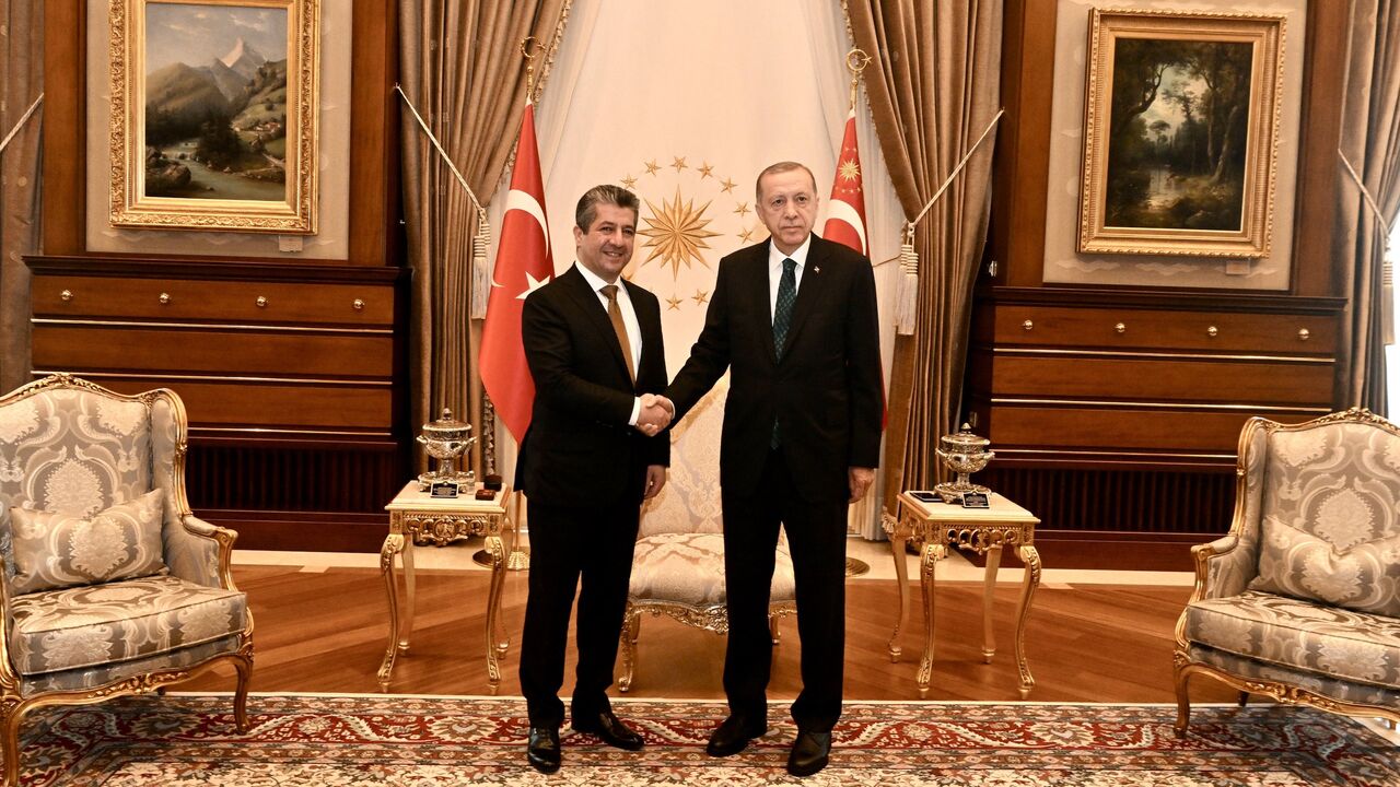 Iraqi Kurdistan Region Prime Minister Masrour Barzani (L) meets with Turkey's President Recep Tayyip Erdogan (R) in Ankara, June 20, 2023.