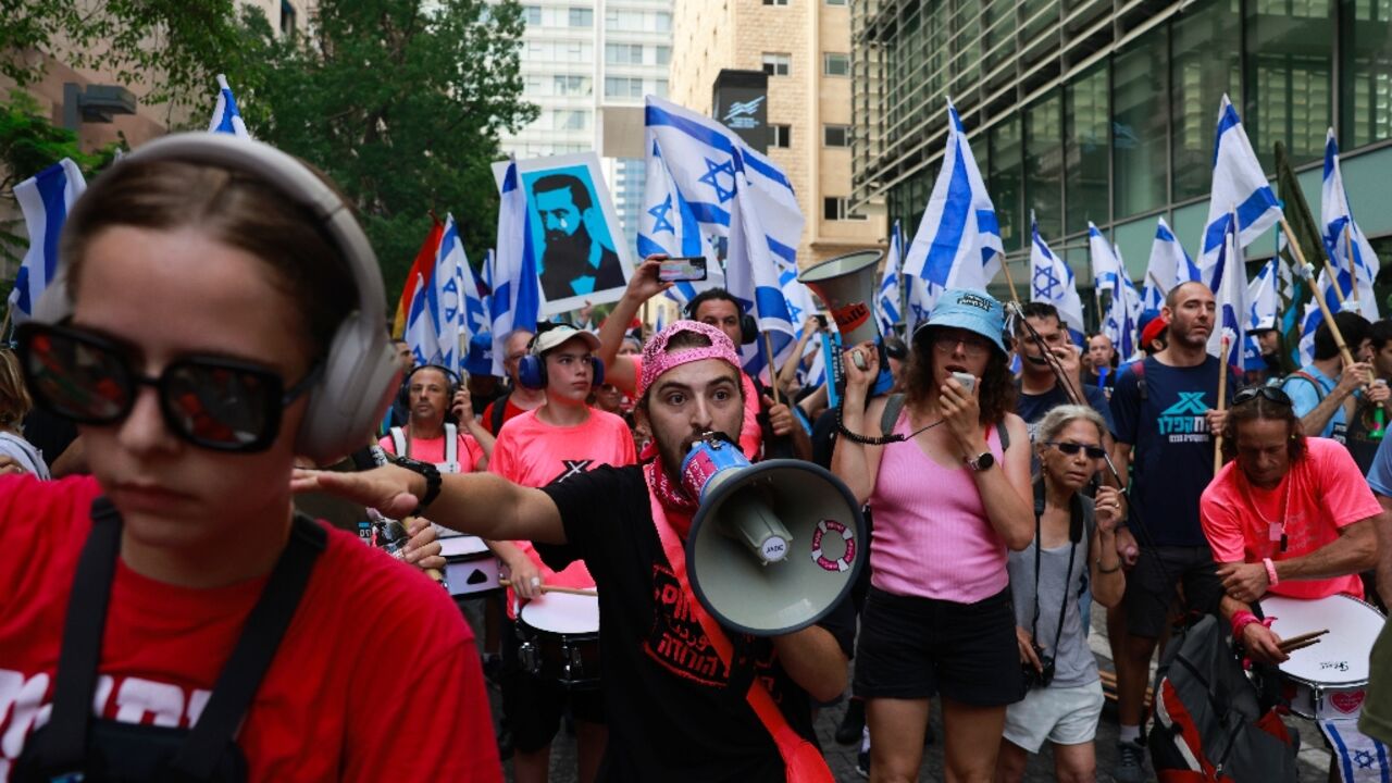 Demonstrators in front of the Tel Aviv stock exchange in a 'day of resistance' against the Israeli government's judicial overhaul