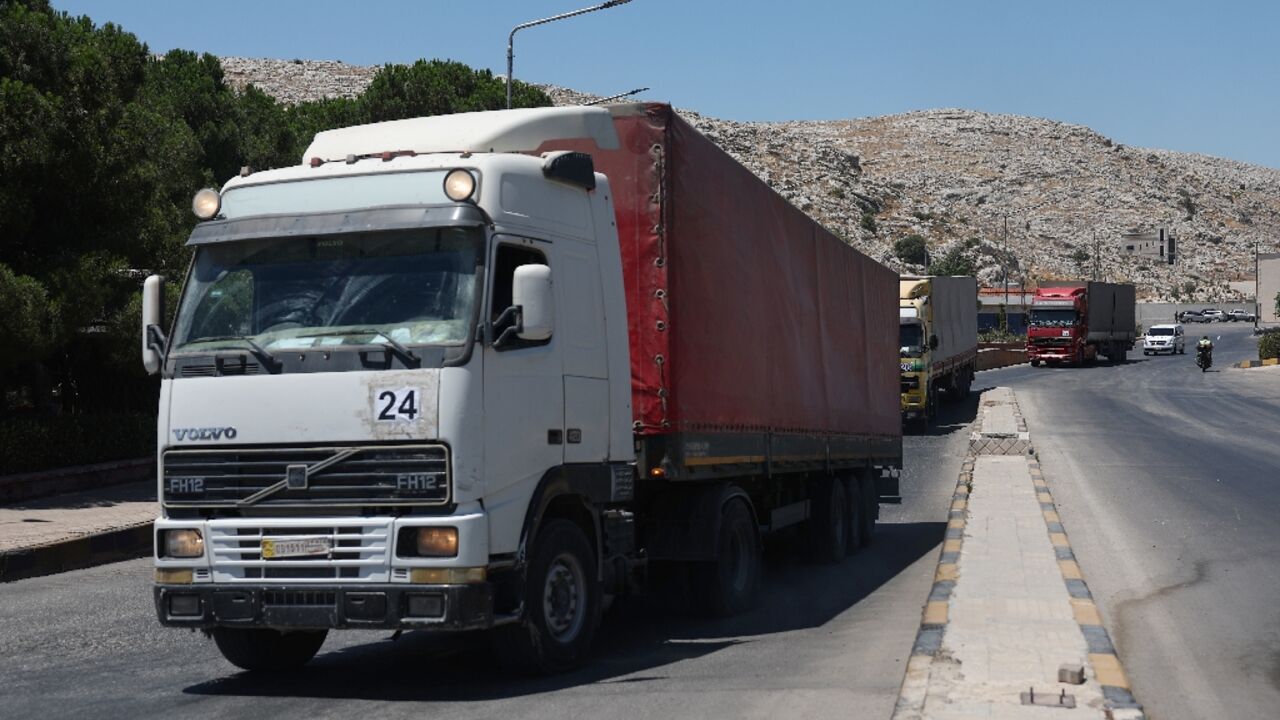 A convoy of humanitarian aid arrives in Syria after entering Syria through the Bab al-Hawa border crossing