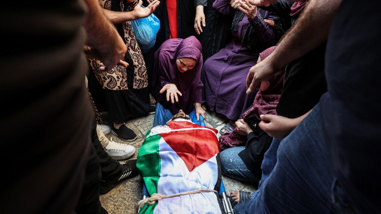 A relative reacts during the funeral of Mustafa al-Kastouni, 32, killed in an Israeli military raid in Jenin in the occupied West Bank