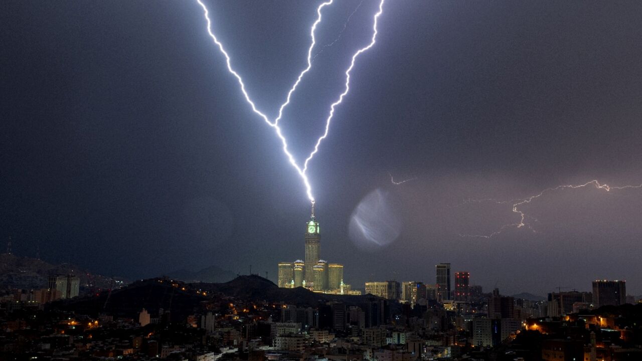 Lightning strikes the clock tower in the Saudi city of Mecca, home to Islam's holiest site