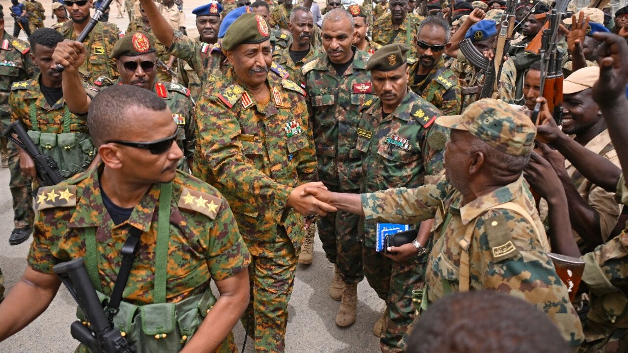 Sudanese army chief Abdel Fattah al-Burhan visits the Flamingo Marine Base in Port Sudan on August 28, 2023