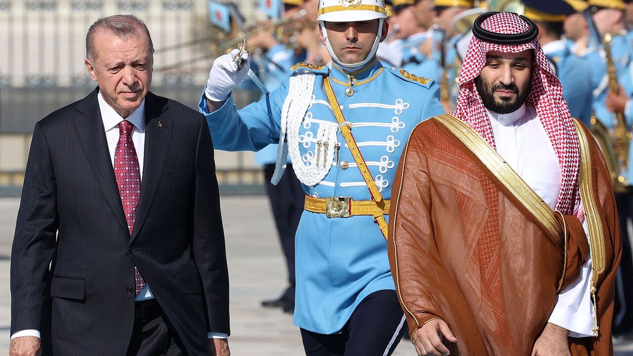 Turkey's President Recep Tayyip Erdogan (L) reviews the honour guard as he welcomes Crown Prince of Saudi Arabia Mohammed bin Salman (R) during an official ceremony at the Presidential Complex in Ankara, on June 22, 2022. - Saudi Arabia's de facto ruler took a big step out of international isolation on June 22, 2022, paying his first visit to Sunni rival Turkey since the 2018 murder of journalist Jamal Khashoggi in the kingdom's Istanbul consulate. (Photo by Adem ALTAN / AFP) (Photo by ADEM ALTAN/AFP via Ge
