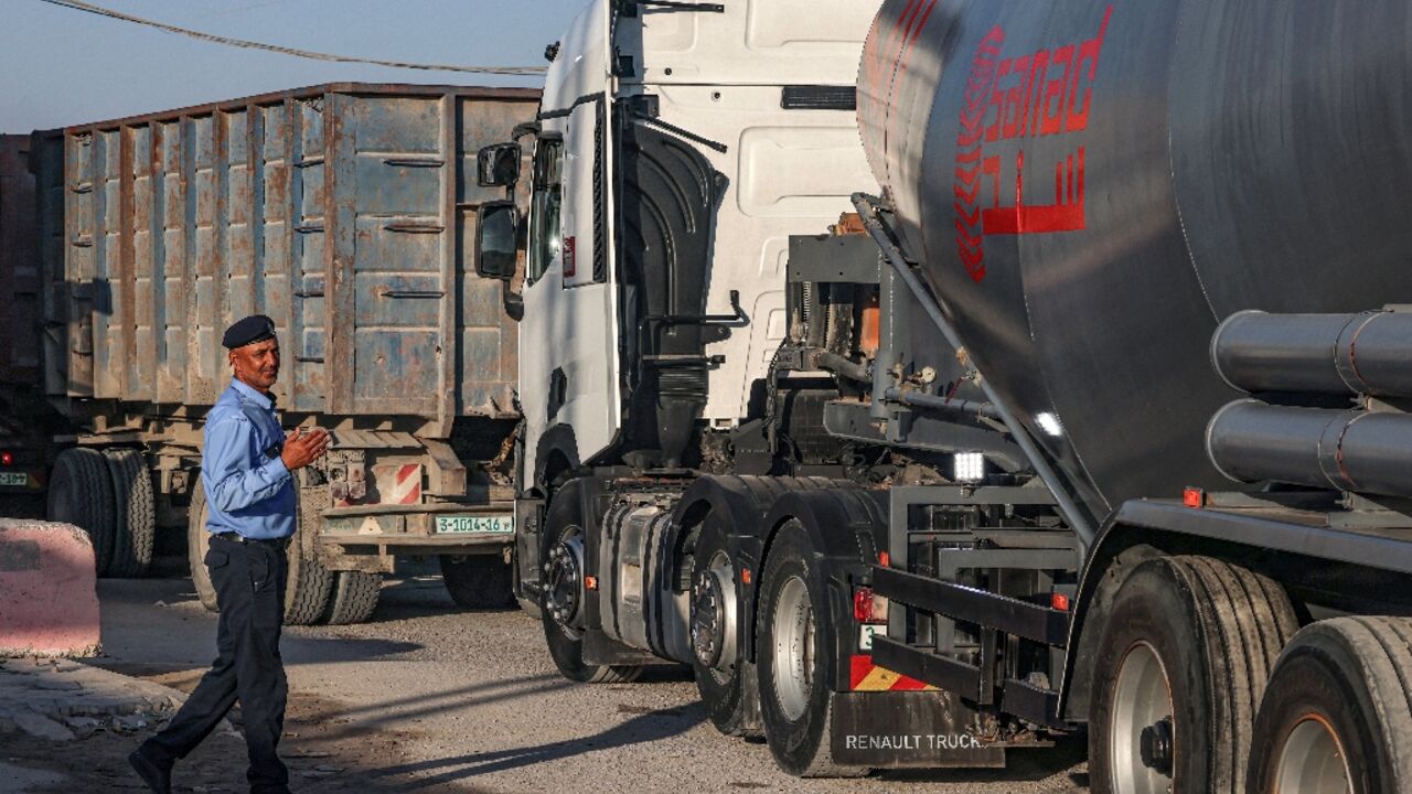 Trucks resume transit through the commercial crossing of Karm Abu Salem, or Kerem Shalom, in Rafah in the southern Gaza Strip