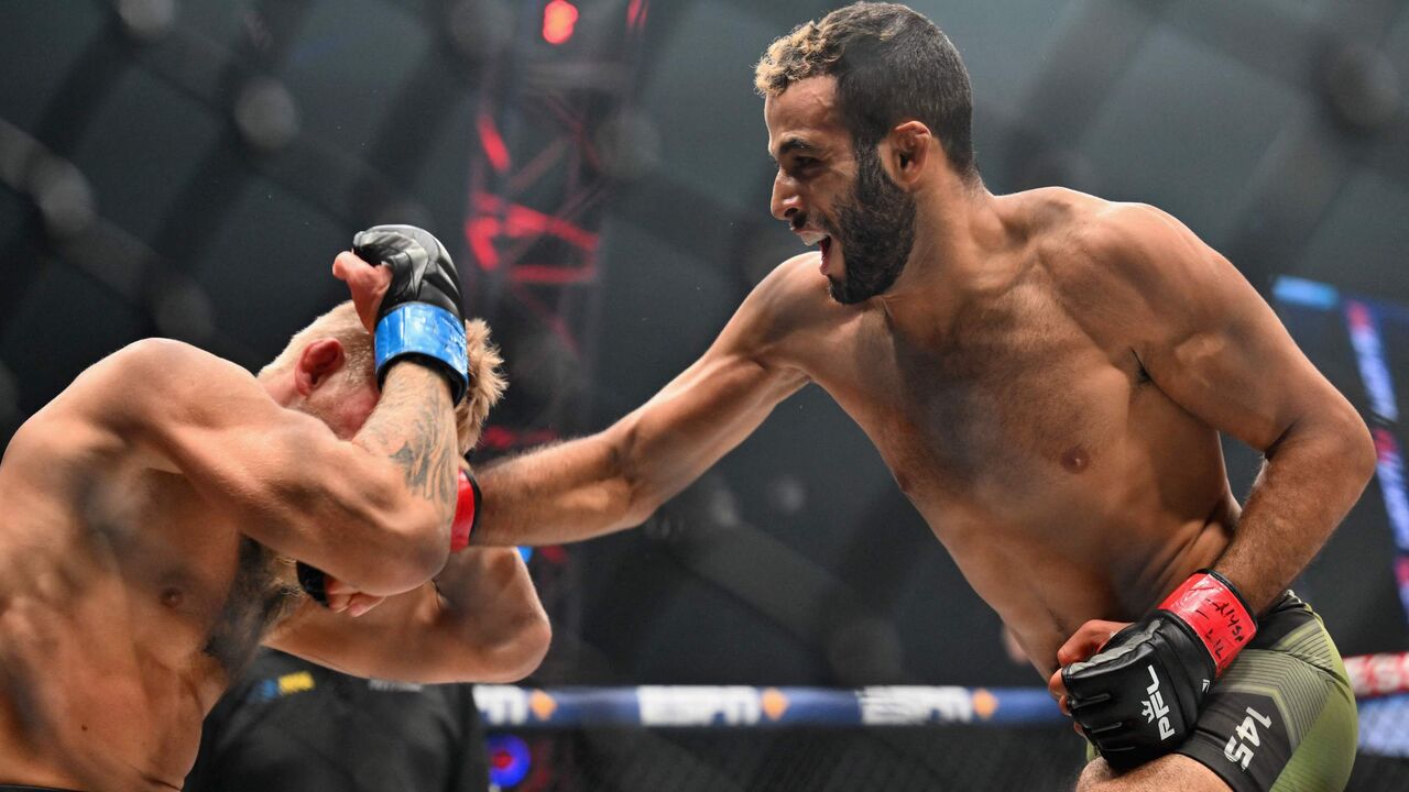 Saudi fighter Abdullah al-Qahtani (R) and US fighter David Zelner (L) compete during the Professional Fighters League 2023 playoffs featherweight fight at the Theater at Madison Square Garden in New York City on Aug. 23, 2023.