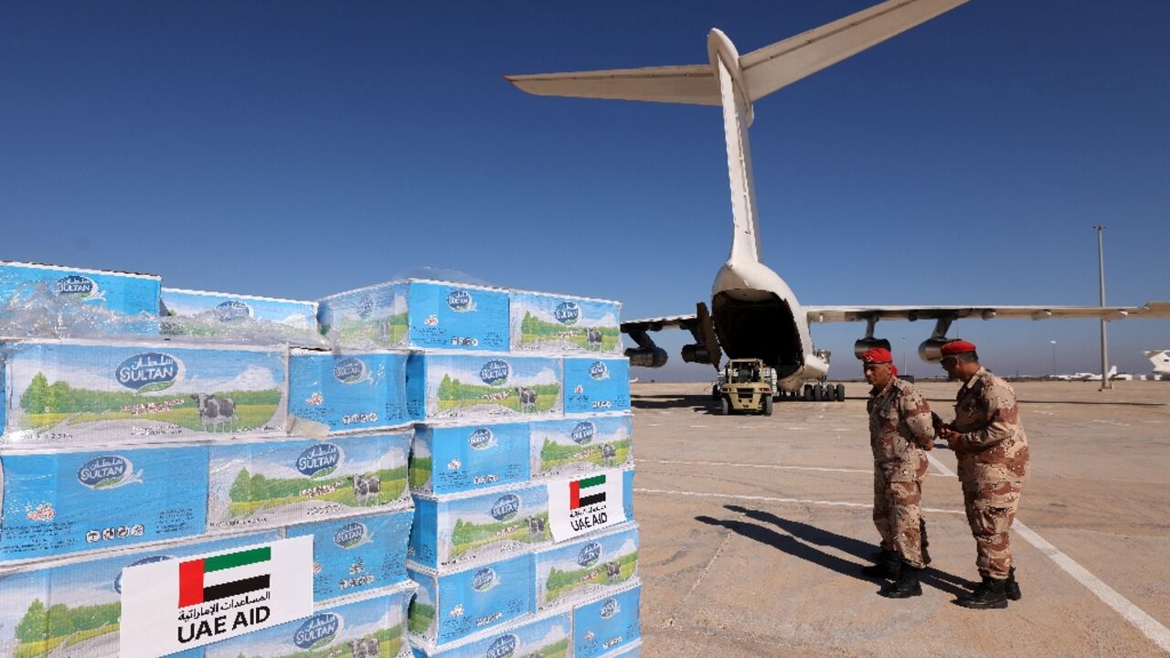 Aid supplied by the United Arab Emirates for survivors of floods that submerged Libya's eastern city of Derna arrives in Benghazi