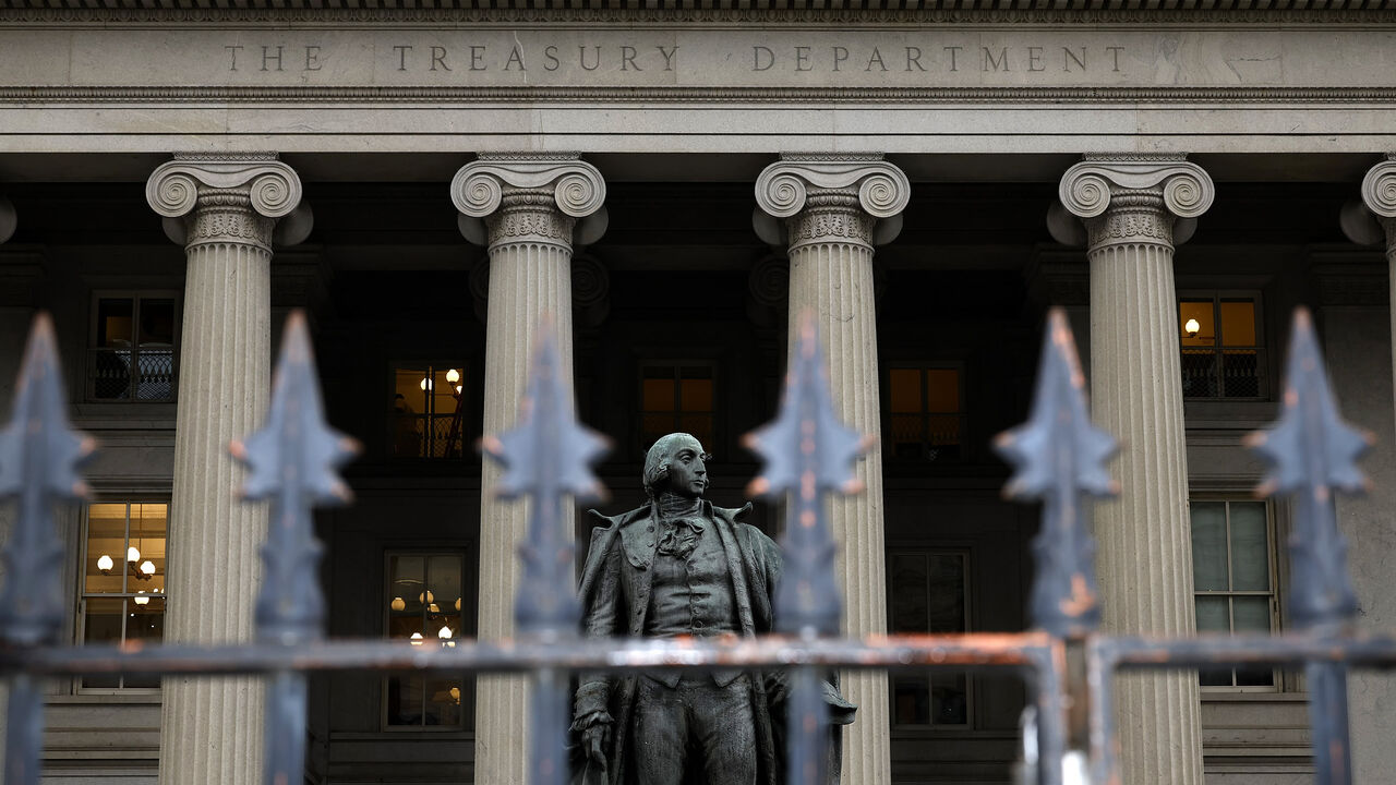 A statue of Alexander Hamilton is seen outside the US Department of Treasury building, Washington, March 13, 2023.