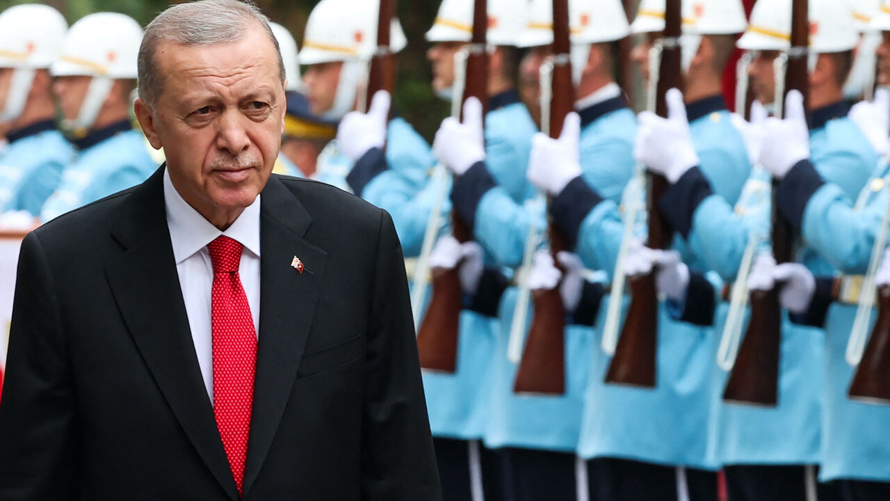 Turkish President Recep Tayyip Erdogan is welcomed by an honor guard ahead of the opening of the Turkish Grand National Assembly in Ankara, Oct. 1, 2023.     