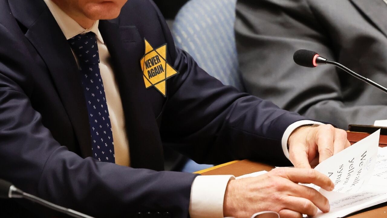 Israel's UN ambassador Gilan Erdan wore a yellow star -- a symbol Jews were forced to wear by the Nazis -- during a meeting of the UN Security Council to protest UN silence on Hamas 'atrocities'