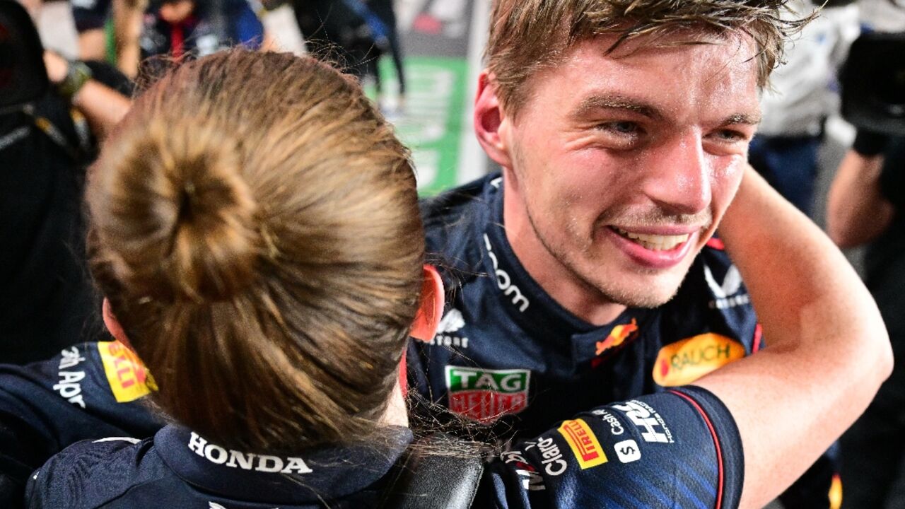 Max Verstappen receives congratulations in the Red Bull pit after qualifying fastest for the Qatar Formula One Grand Prix