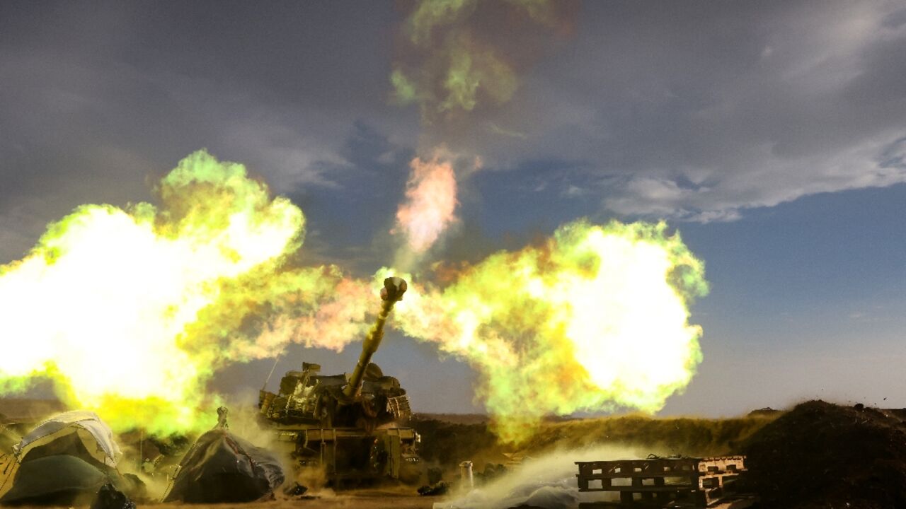 An Israeli artillery unit fires during a military drill in the annexed Golan Heights near the border with Lebanon