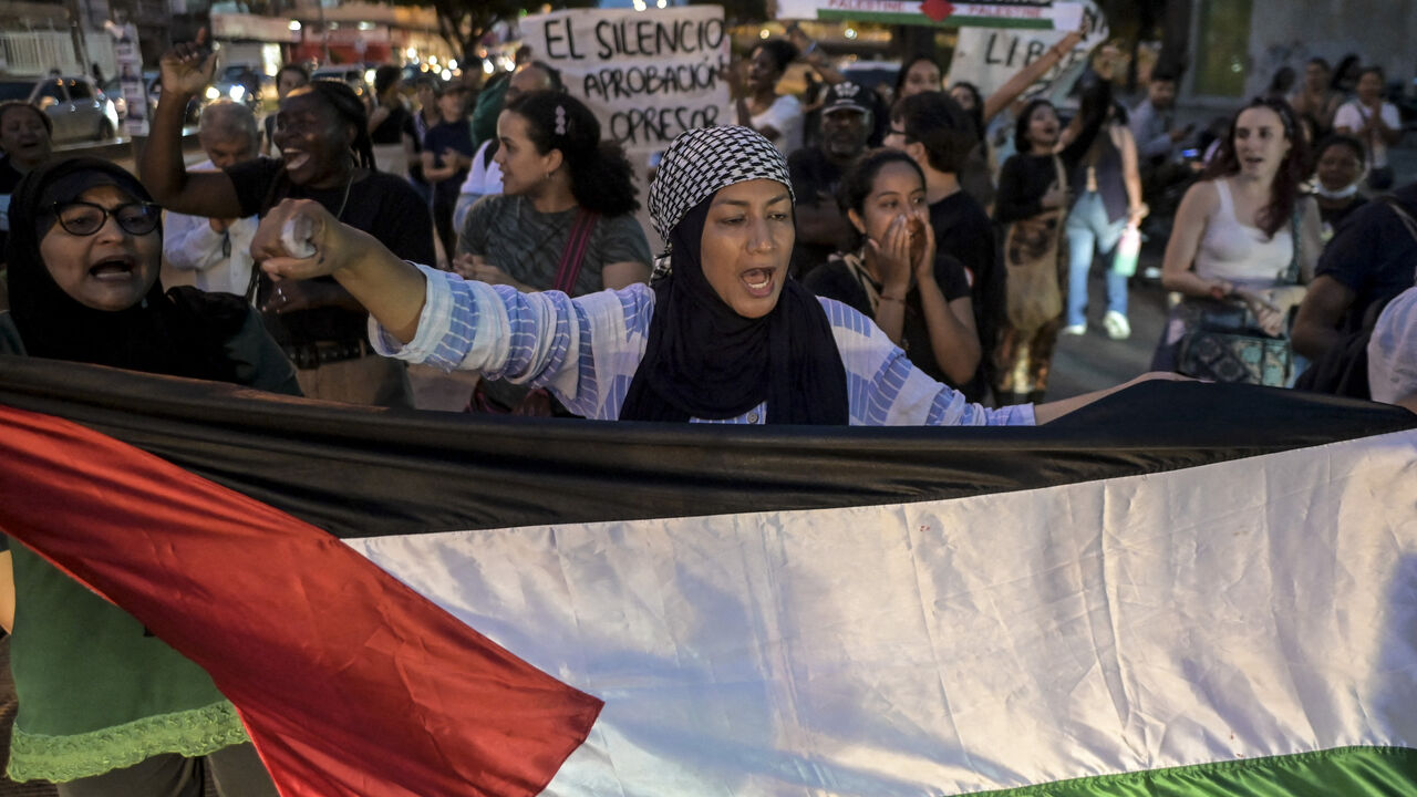 People demonstrate in support of Palestinians in Cali, Colombia, on Oct. 19, 2023.