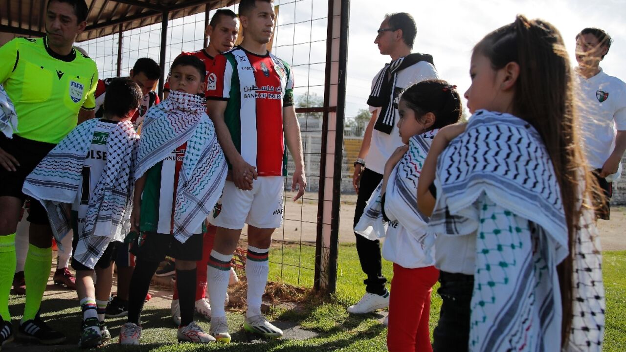 Players from Club Deportivo Palestino prepare to take the field in Santiago, Chile, on November 23, 2023