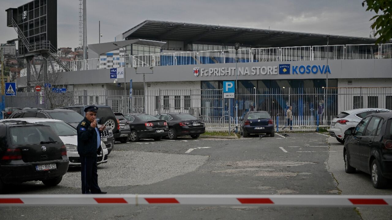 Police stand guard near the Fadil Vokrri stadium in Pristina ahead of Kosovo's rearranged Euro 2024 qualifier against Israel