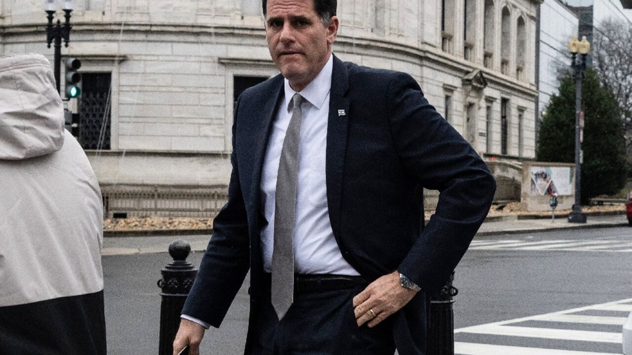 Israel's Minister for Strategic Affairs Ron Dermer walks into the Executive Office Building next to the White House on Tuesday