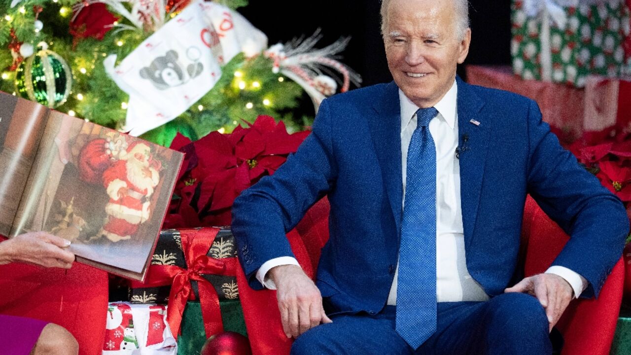 US President Joe Biden pays a holiday visit to patients and families at Children's National Hospital in Washington on December 22, 2023
