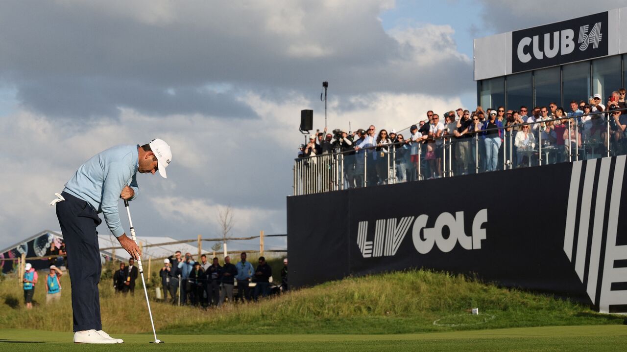 South African golfer Charl Schwartzel plays a last shot on the 18th hole during the third and final day of the LIV Golf Invitational Series event at The Centurion Club in St Albans, north of London, on June 11, 2022.