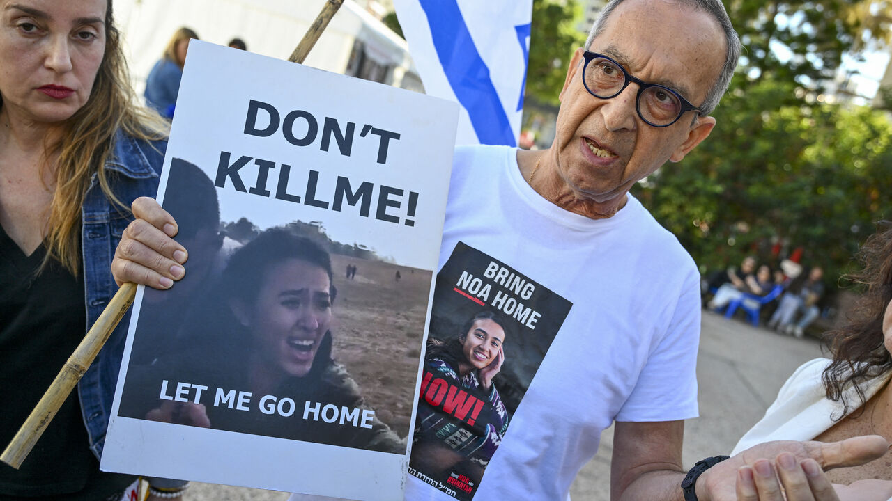 Yakov Argamani, father of 26-year-old Israeli hostage Noa Argamani, speaks to media outside the Tel Aviv Museum of Art, now informally called the "Hostages Square", in Tel Aviv on Dec. 16, 2023, amid continuing battles between Israel and the Palestinian militant group Hamas. The Israeli army was on December 16 investigating the killing of three hostages which it said had been mistakenly identified as a threat by soldiers, an incident that sparked protests in Tel Aviv. 
