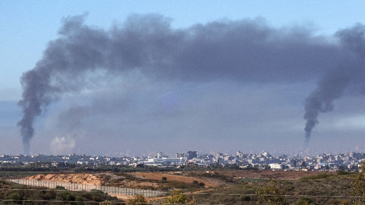 Smoke billows over the northern Gaza Strip during Israeli bombardment