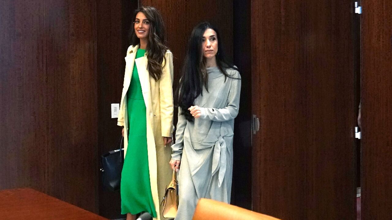 Attorney Amal Clooney (L), co-Founder is part of a legal team representing Nadia Murad (R)and some 430 Yazidi Americans in a suit against French company Lafarge