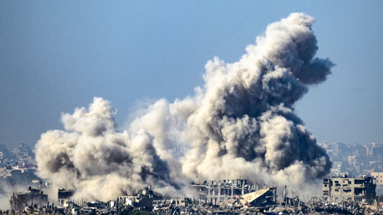Smoke rising from buildings hit by Israeli strikes in Gaza