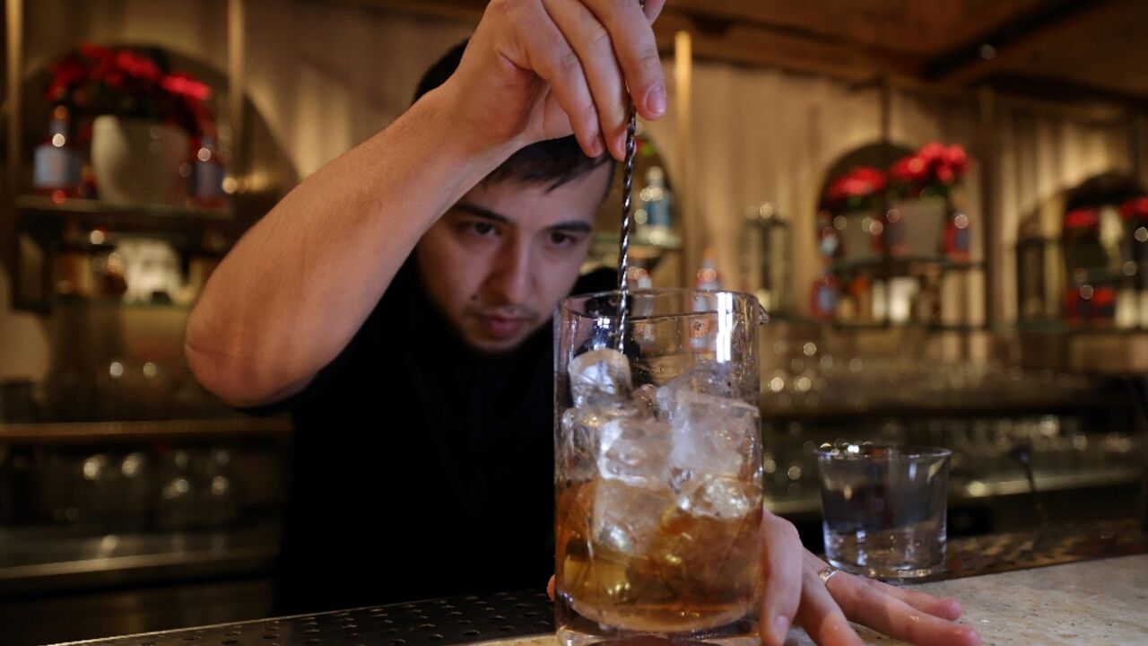 A bartender prepares a non-alcoholic cocktail in Riyadh
