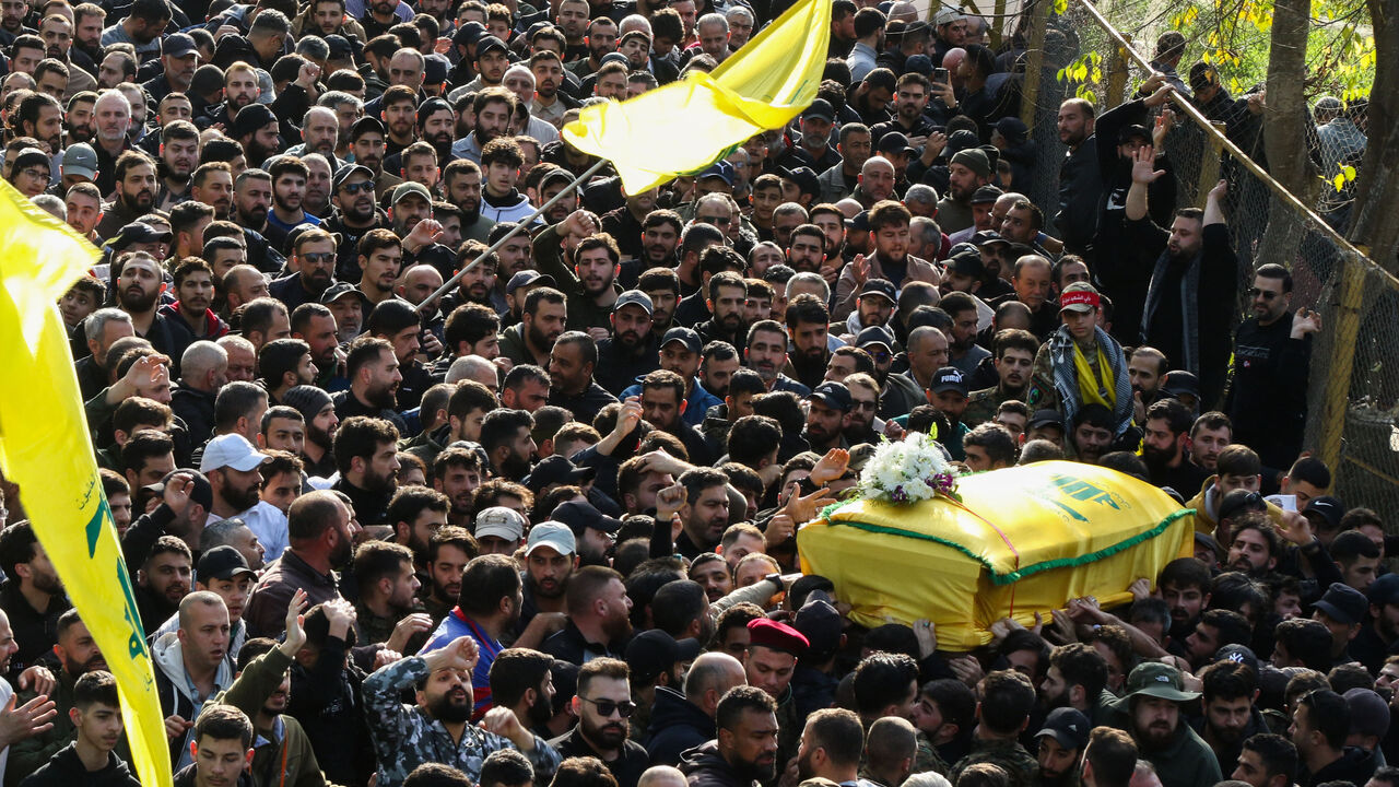 Hezbollah fighters and supporters attend the funeral of slain Hezbollah military commander Wissam Tawil, also know as Jawad, in his hometown of Khirbet Selm, south of Beirut on January 9, 2024. Hezbollah announced on January 8 the killing of a "commander" for the first time, naming him as Wissam Hassan Tawil. A security souce in Lebanon, requesting anonymity for security reasons, said Tawil "had a leading role in managing Hezbollah's operations in the south", and was killed there by an Israeli strike target