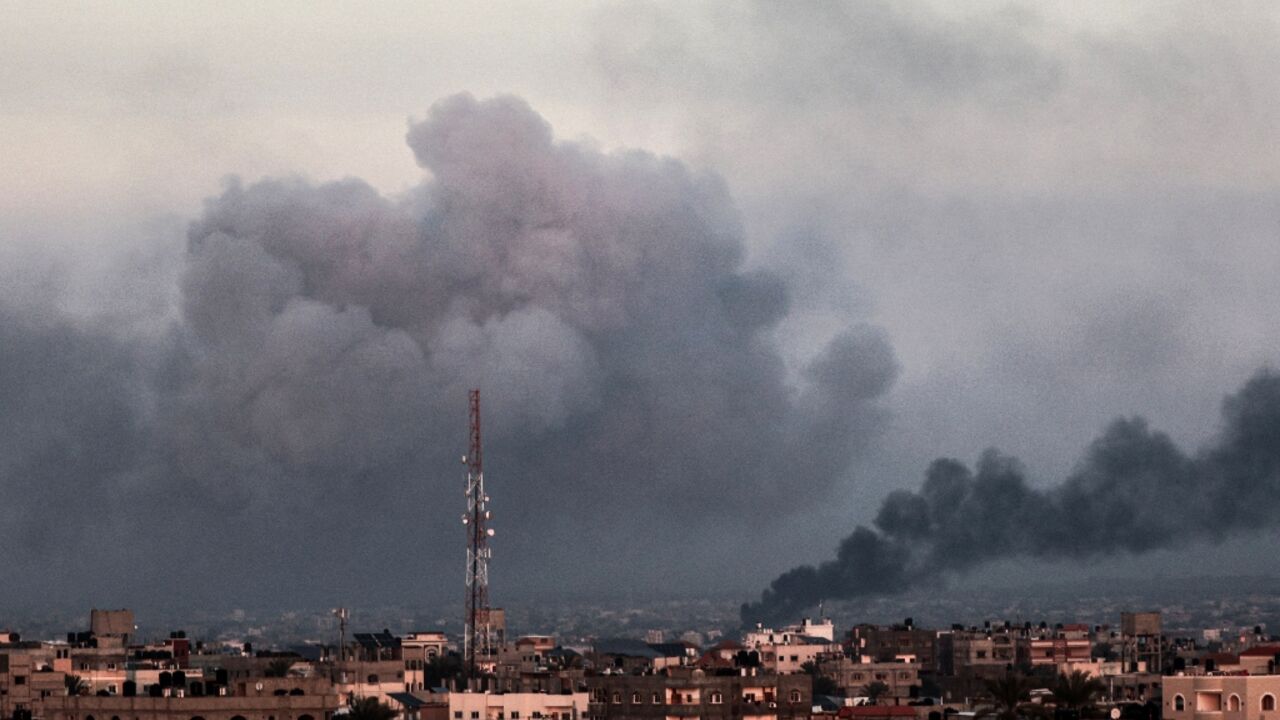Smoke billows over Khan Yunis in the southern Gaza Strip on Tuesday