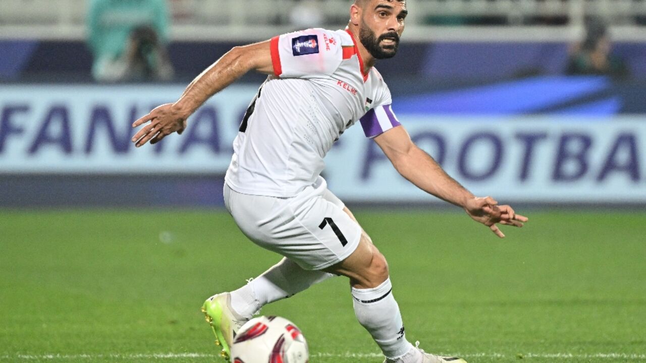Musab Al-Battat in action for Palestine at the Asian Cup
