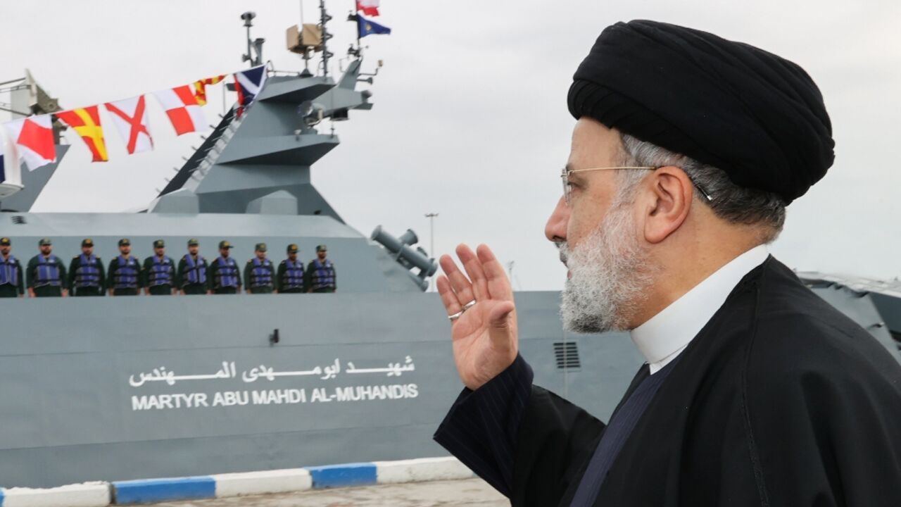 Iranian President Ebrahim Raisi visits a Revolutionary Guards naval base in the Gulf port of Bandar Abbas, where he warned Washington against targeting Tehran