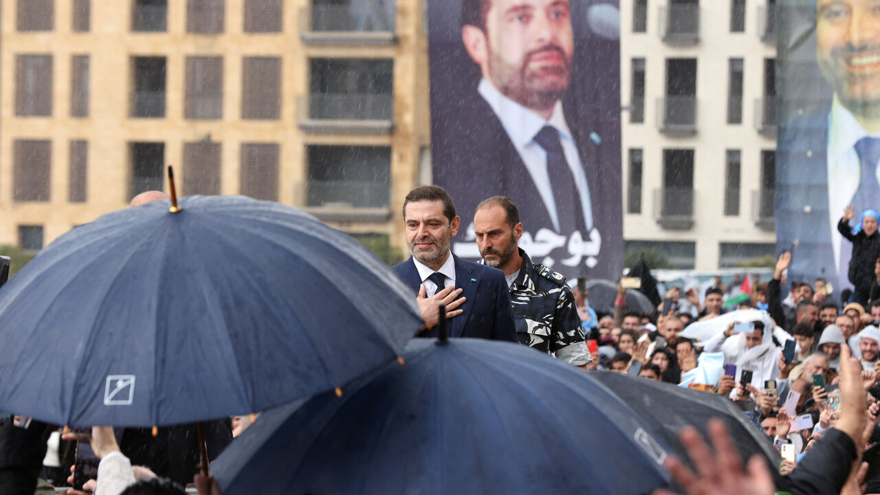 Former Lebanese prime minister Saad Hariri greets his supporters after he prayed at the grave of his father, slain prime minister Rafic Hariri, during a commemoration for the 19th anniversary of his assassination, in Beirut, on February 14, 2024. (Photo by ANWAR AMRO / AFP) (Photo by ANWAR AMRO/AFP via Getty Images)