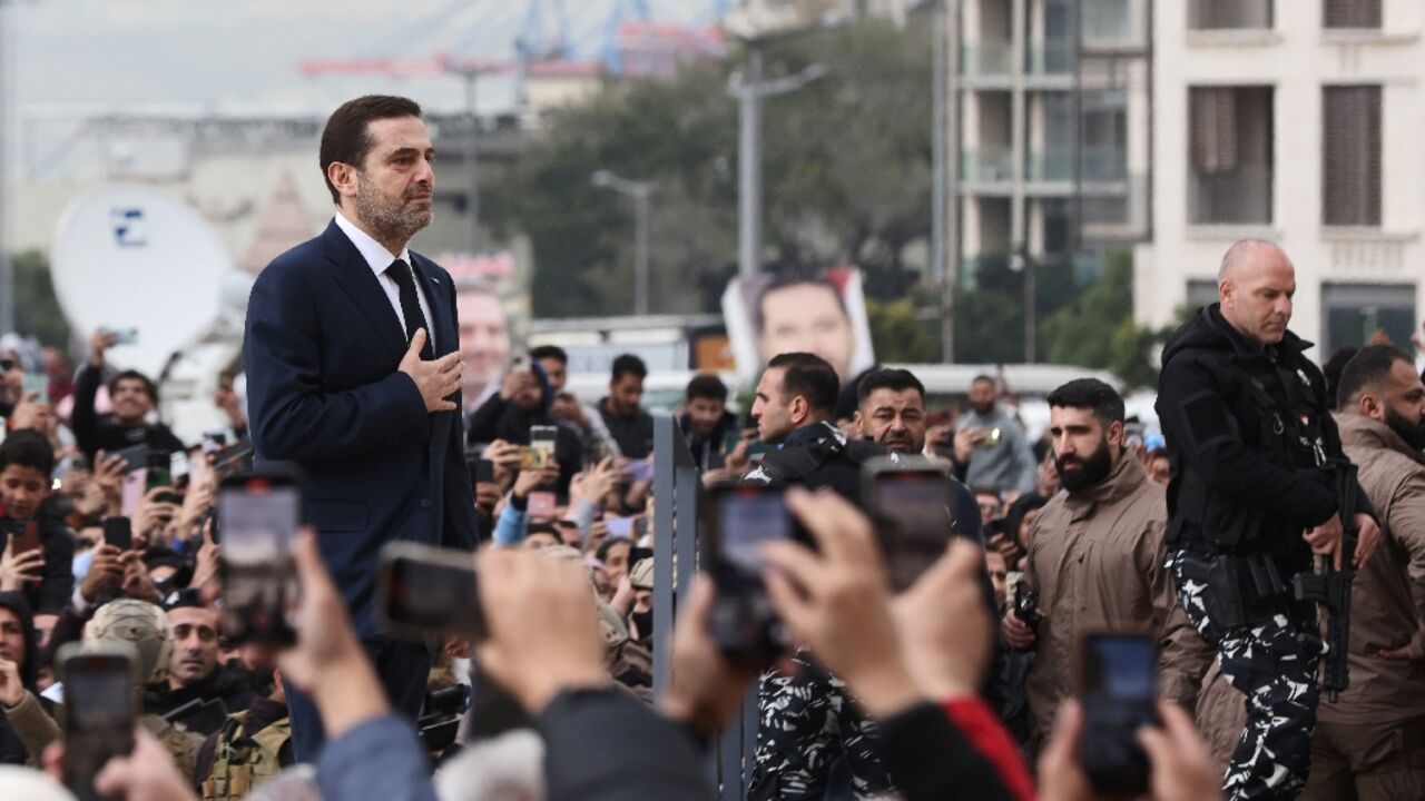 Former Lebanese prime minister Saad Hariri greets supporters after performing anniversary prayers at the grave of his father Rafic, assassinated in a 2005 truck bombing