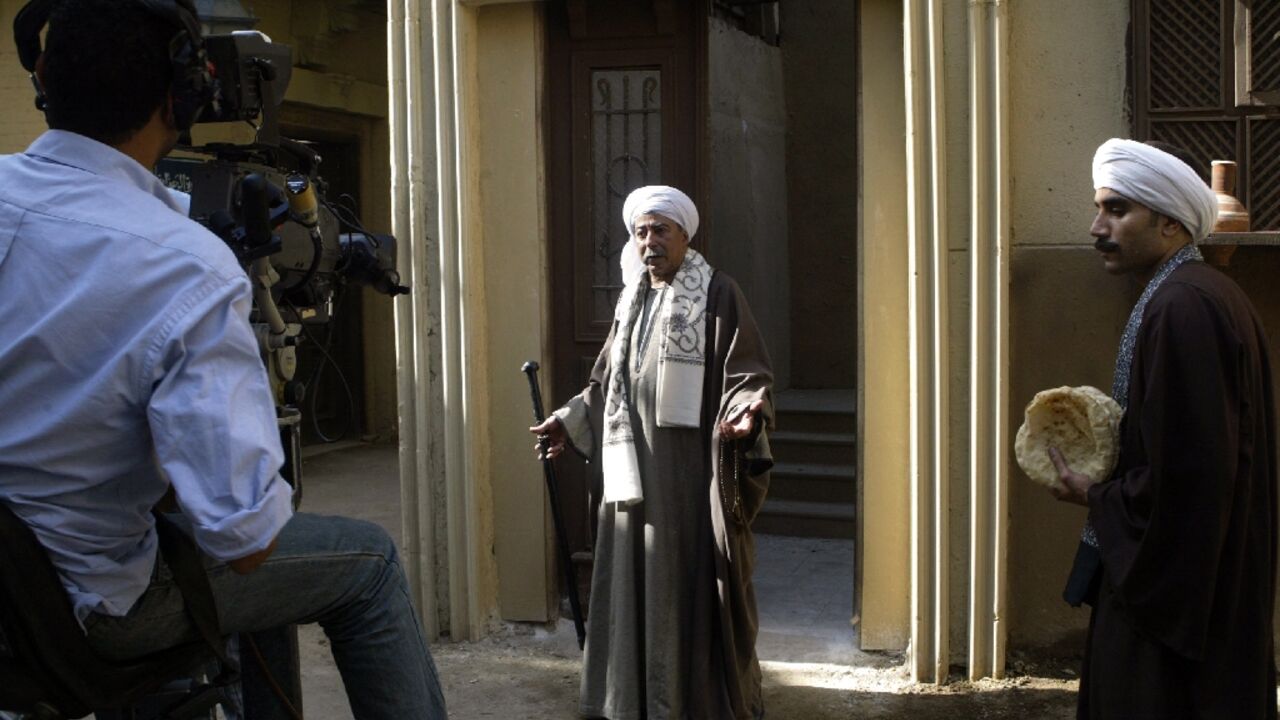 During filming in 2006 at Cairo's Al-Ahram Studio, Salah al-Saadani performs in the Ramadan TV series 'Haret al-Zaafarani'