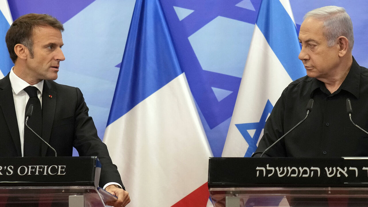 Israeli Prime Minister Benjamin Netanyahu (R) and French President Emmanuel Macron (L) hold a joint press conference in Jerusalem on Oct. 24, 2023. 