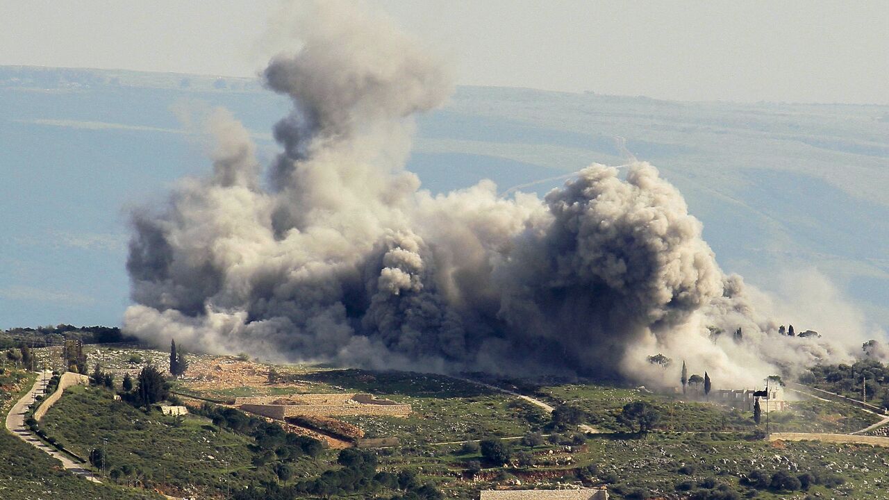 Smoke billows from the area of an Israeli air strike on the southern Lebanese village of Khiam, near the border with Israel on March 23, 2024.