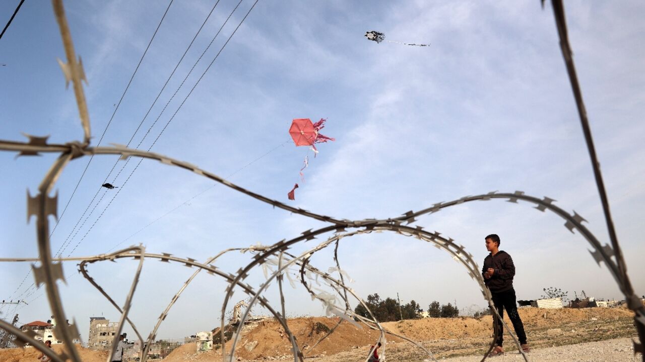 Children have turned to flying kites in southern Gaza as a respite to the harsh realities of war
